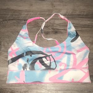 Roxy pink white and blue sports bra size small